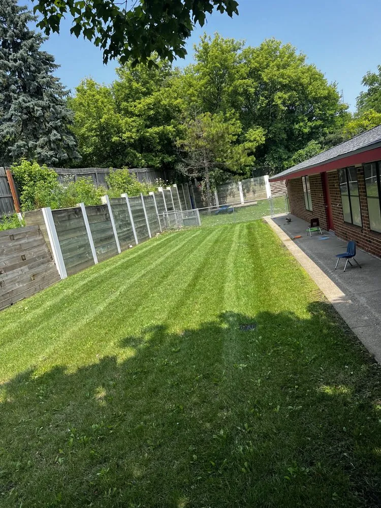 Professional lawn mowing service for homes in Madison, WI by J&C Lawn Care Service