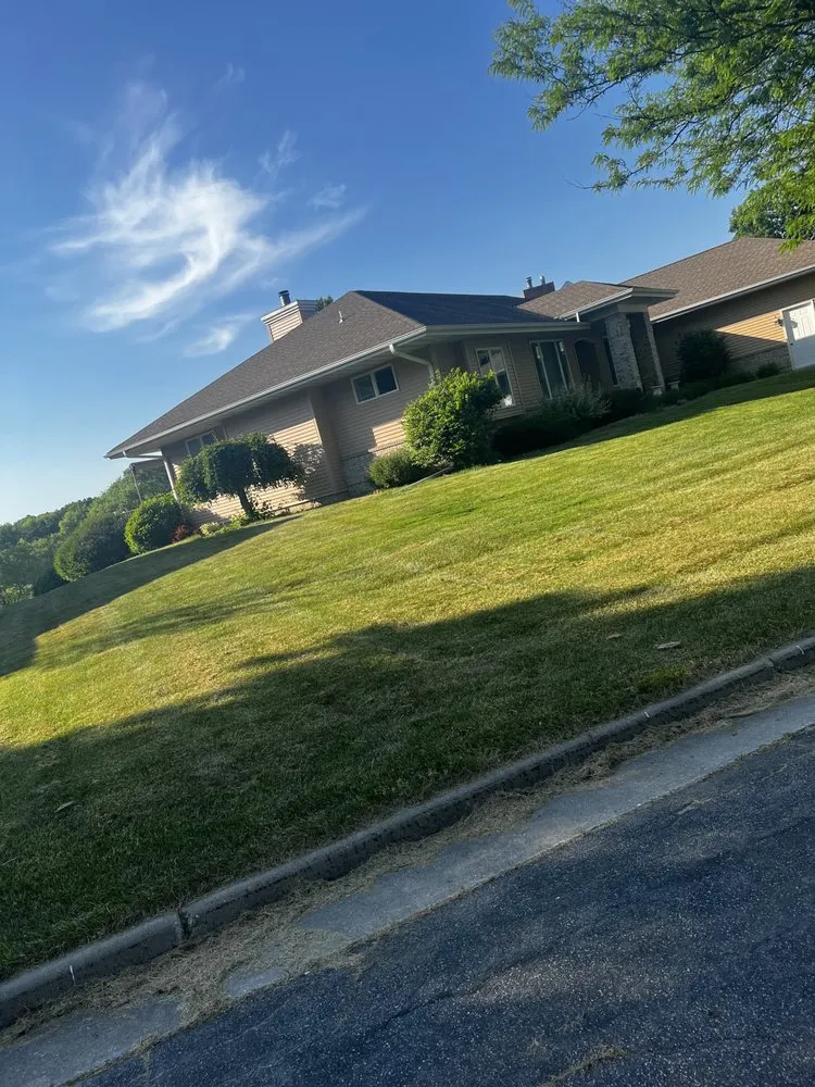 Custom lawn mowing service for year-round maintenance across Madison, WI - J&C Lawn Care Service