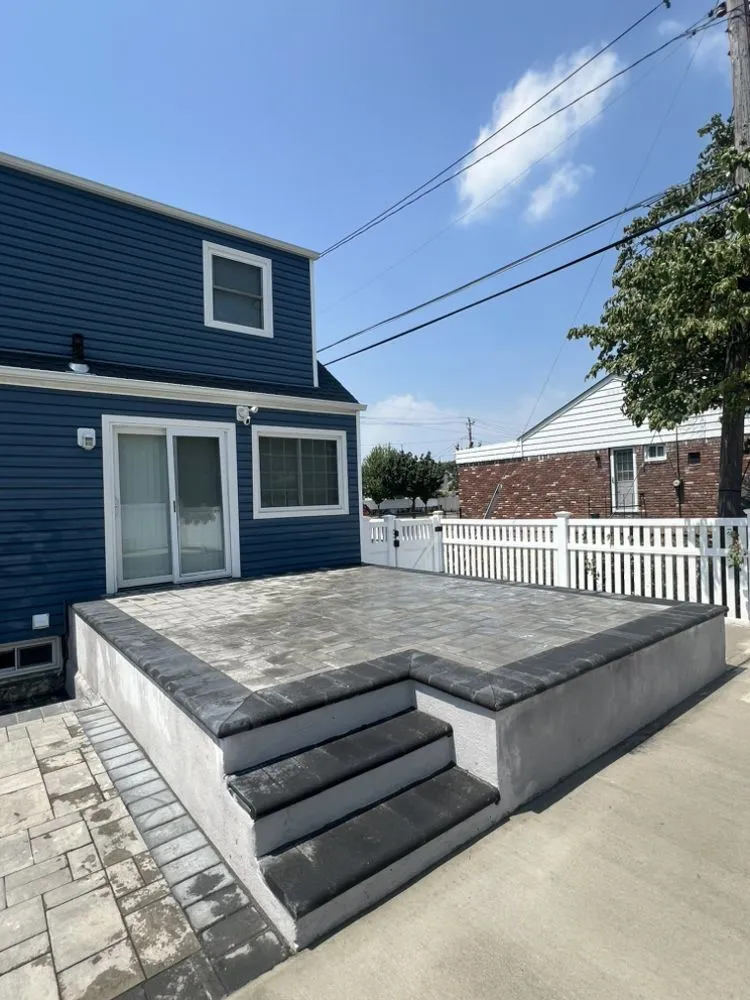 Reliable lawn mowing service with custom design in Bay Shore, NY by JC Masonry & Concrete