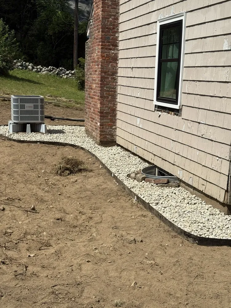 Professional lawn care service for year-round maintenance in Norwood, MA by JC Neto Landscape