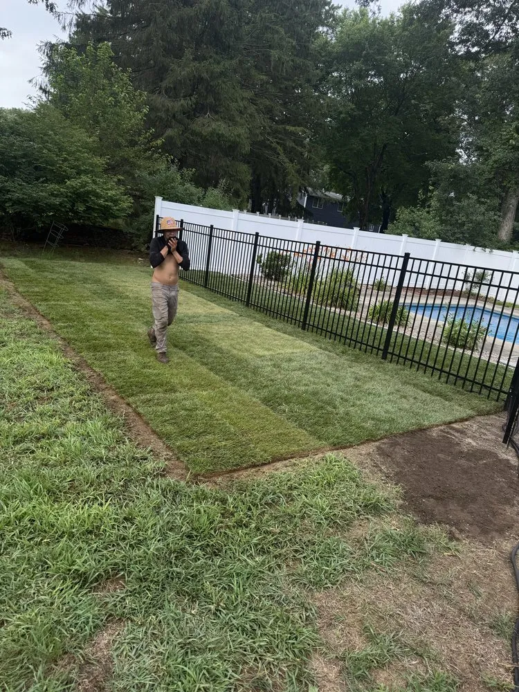 Affordable lawn mowing service for homes in Norwood, MA by JC Neto Landscape