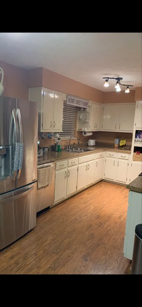 Affordable lawn mowing service for year-round maintenance across London, KY - J&C Painting & More