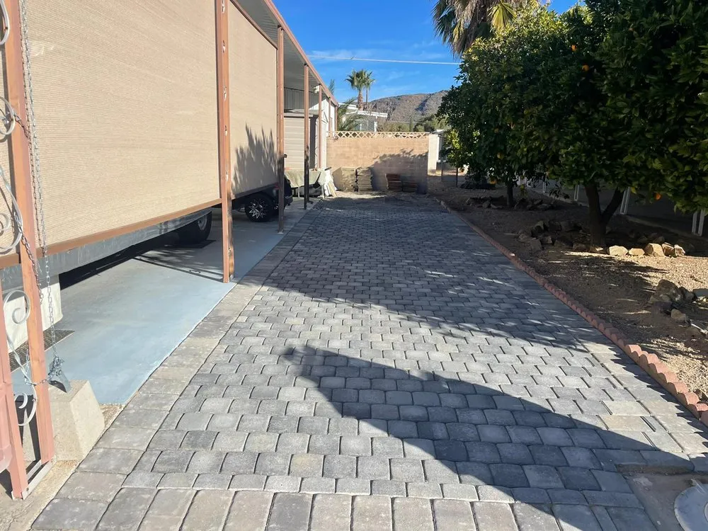 Affordable lawn mowing service for residential properties in Tucson, AZ by JC PaversAz