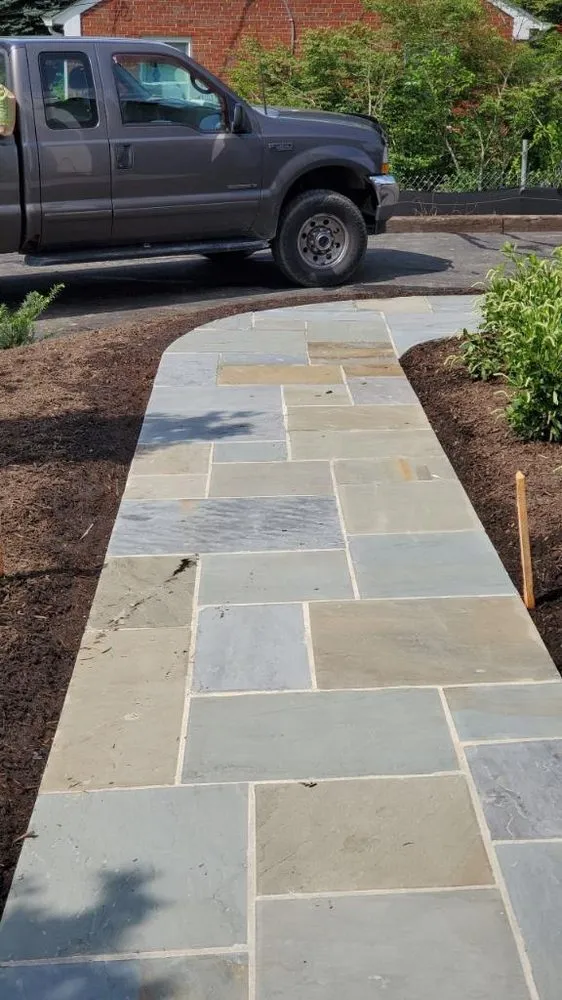 Professional yard maintenance for homes in Beltsville, MD by J&C Stonework & Landscaping