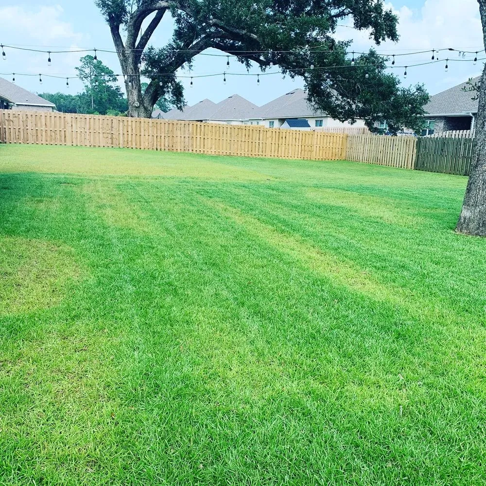 Custom outdoor landscaping with custom design in Pensacola, FL by JCL Landscaping