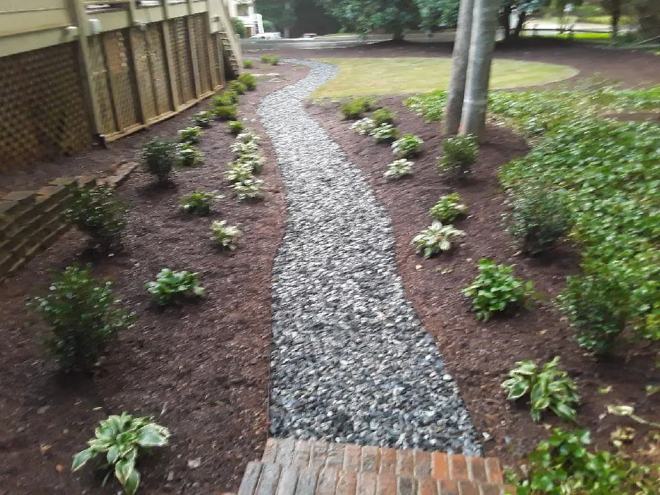 Professional landscape design for residential properties in Lilburn, GA by JD Landscape Solutions and Stone Work