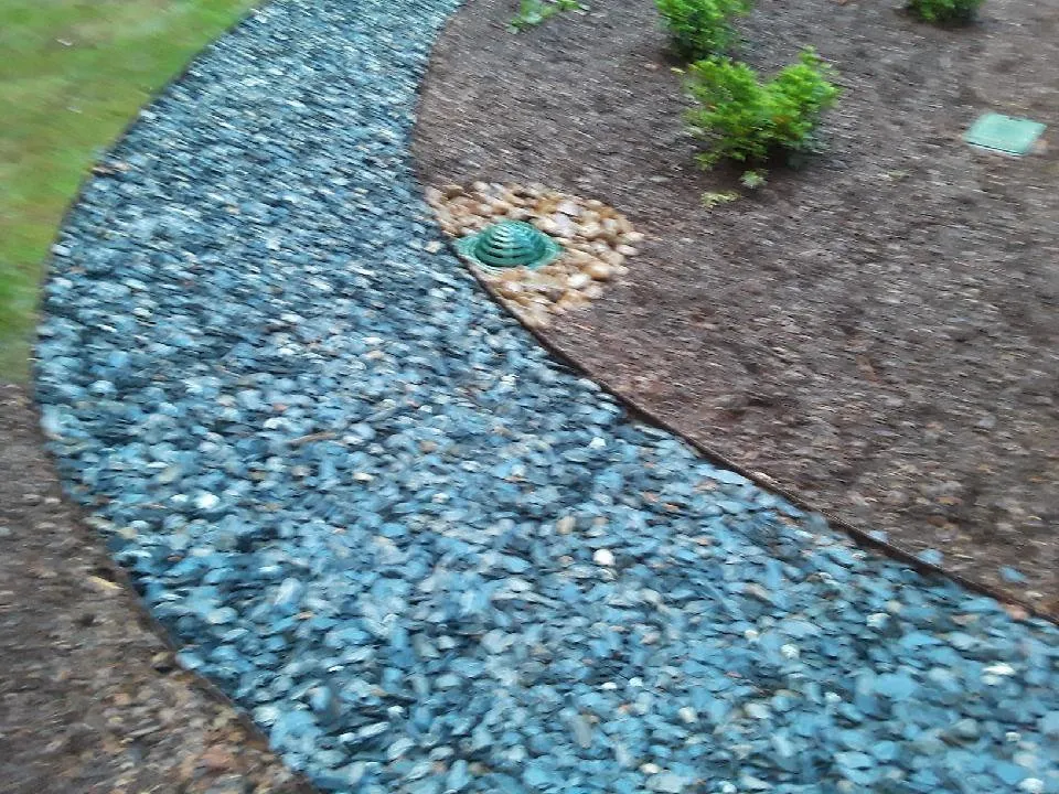Custom residential landscaping for homes in Lilburn, GA by JD Landscape Solutions and Stone Work