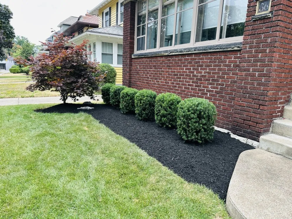 Custom lawn care service for residential properties in Getzville, NY by JD Landscaping & Snowplowing