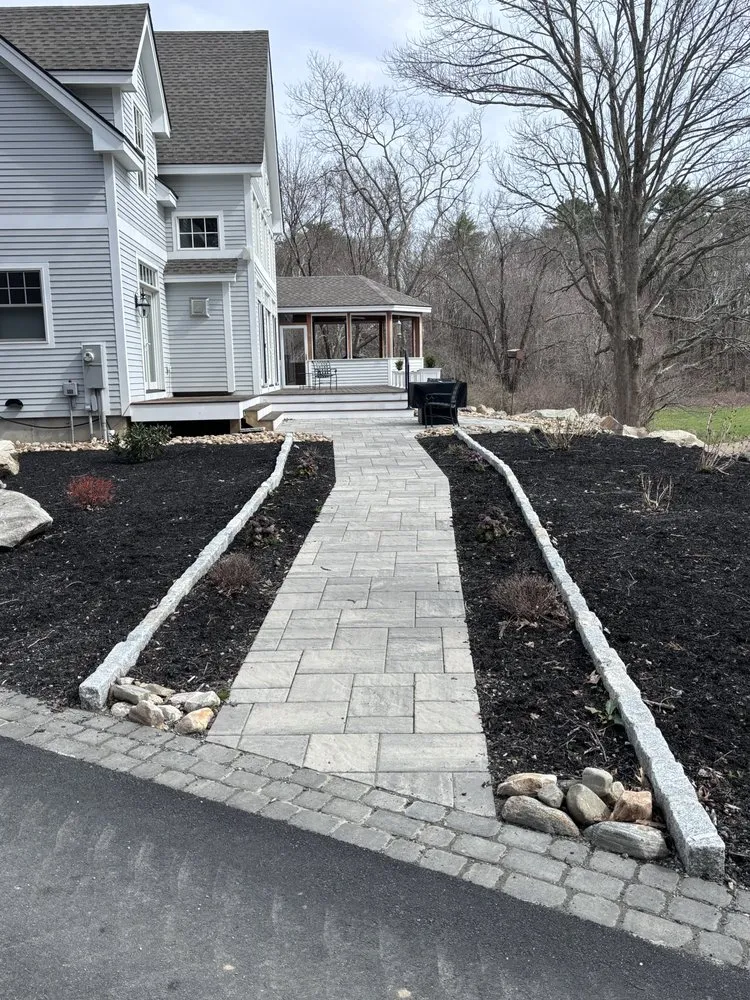 Professional yard maintenance for residential properties across Lowell, MA - JD Stoneworks