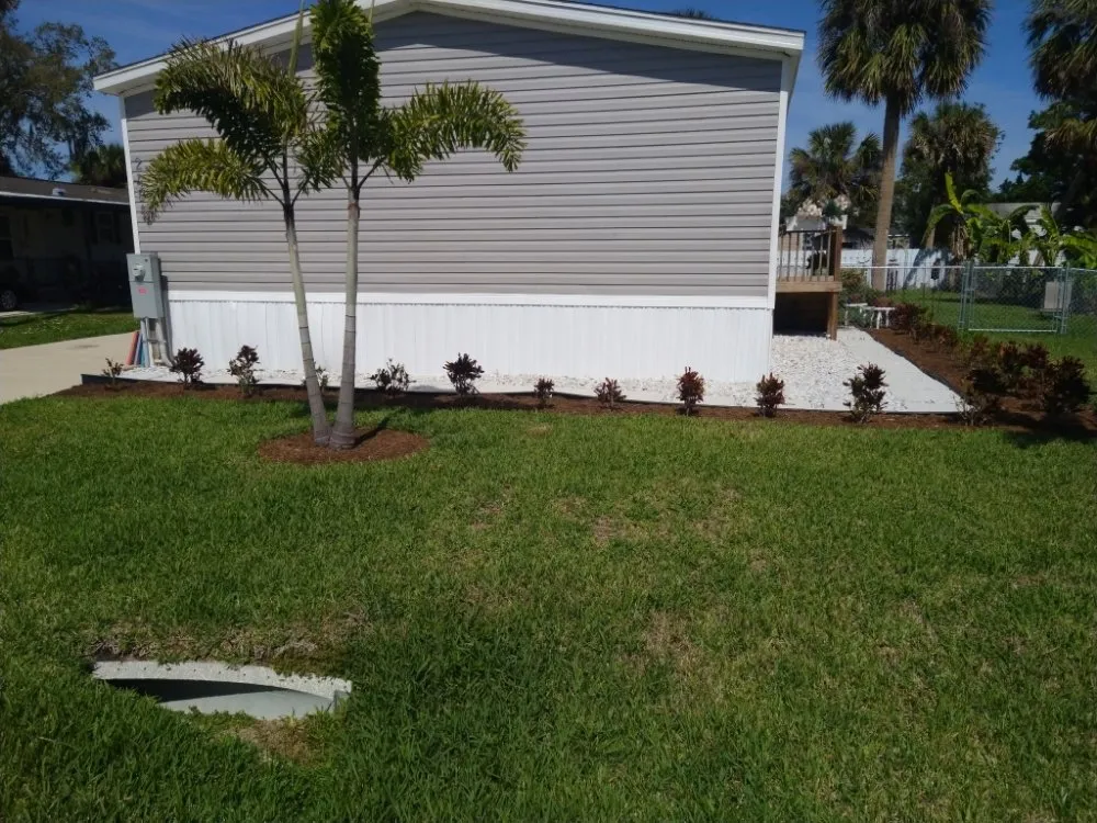 Local landscaping services for residential properties in North Fort Myers, FL by J&D Wizard Of Odd
