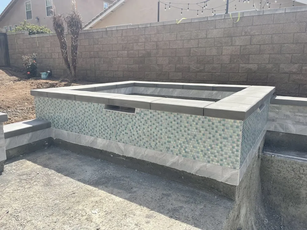 Custom landscape installation with custom design in Upland, CA by JDC Concrete