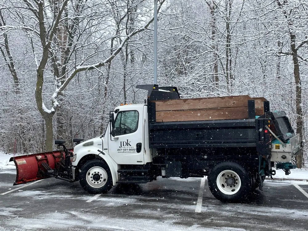 Affordable yard cleanup service for year-round maintenance in West Dundee, IL by JDK Services
