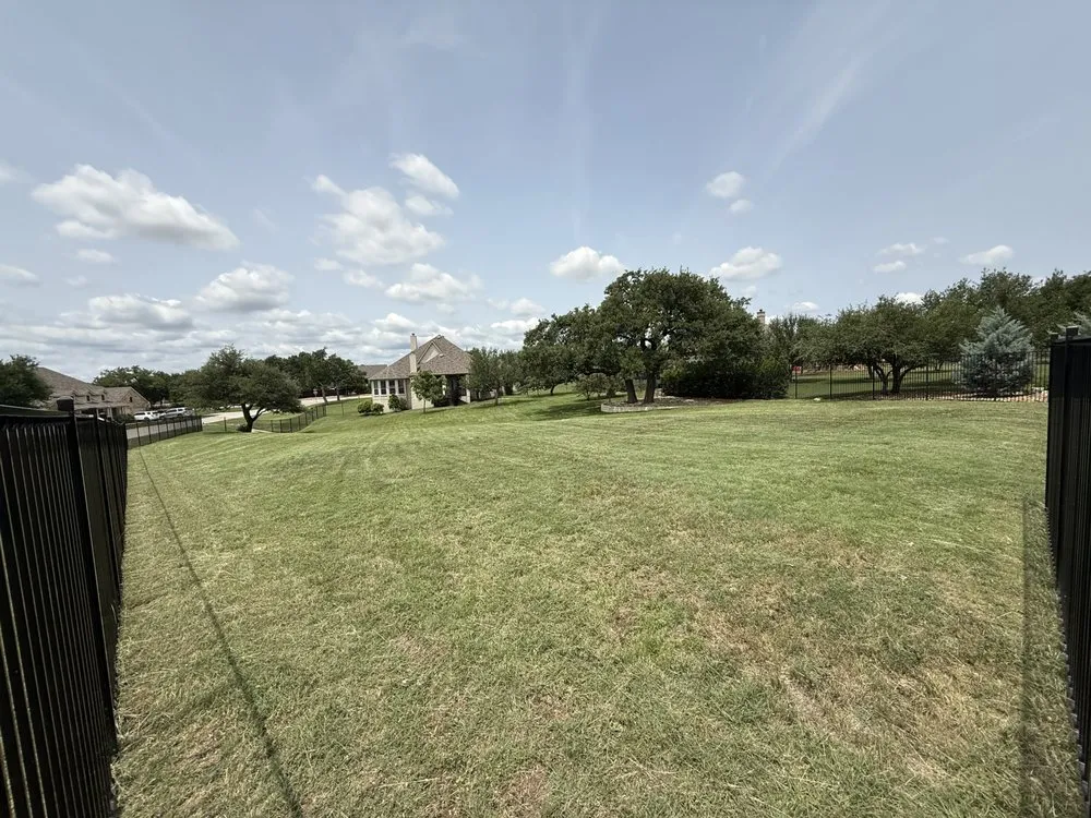 Custom outdoor landscaping in Leander, TX by JDV Lawn and Tractor Service