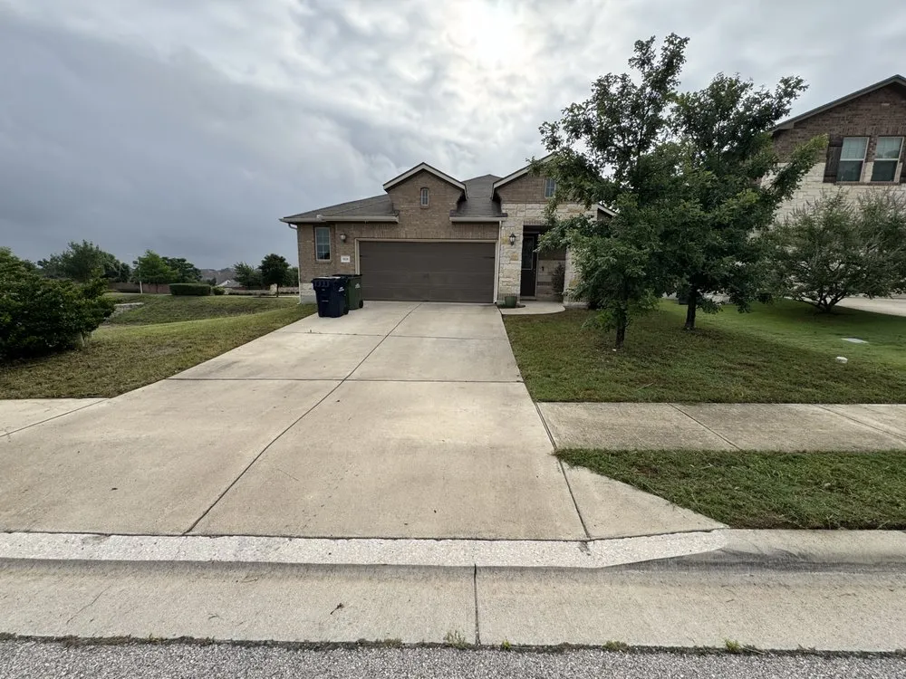 Expert lawn mowing service in Leander, TX by JDV Lawn and Tractor Service