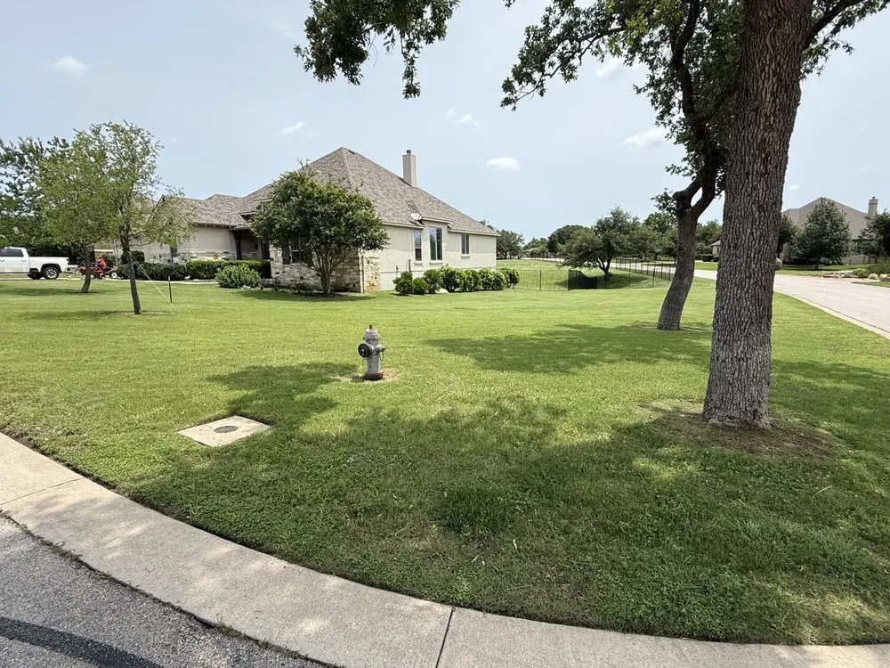 Affordable landscape installation for beautiful yards in Leander, TX by JDV Lawn and Tractor Service