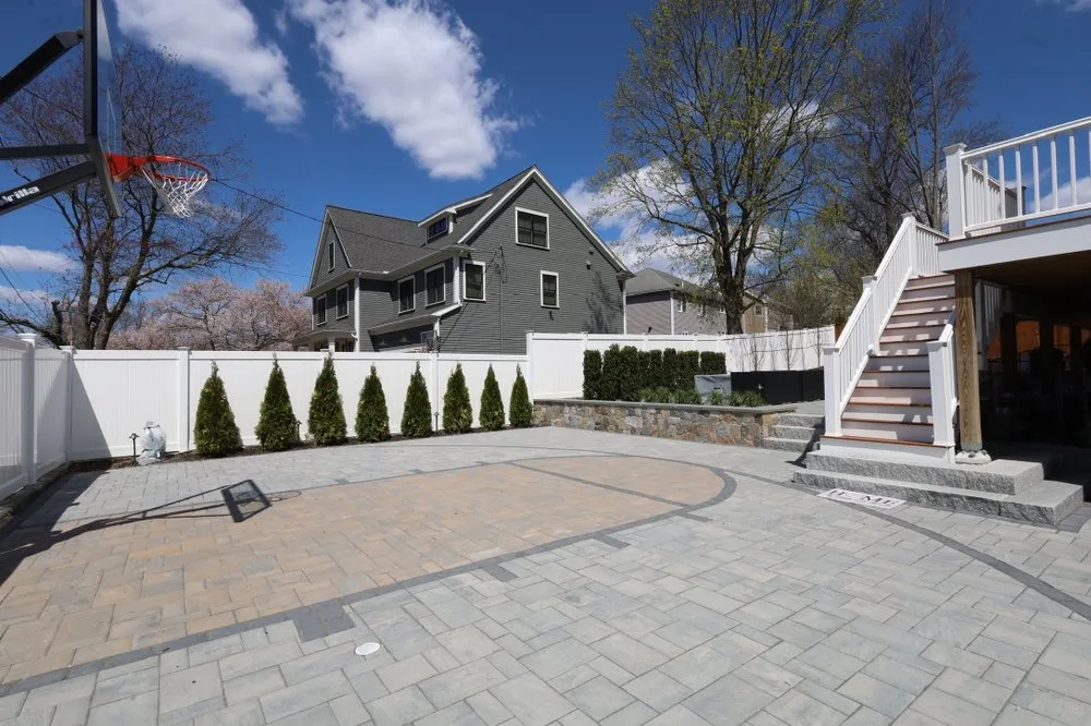 Top-rated lawn mowing service in Woburn, MA by J&E Corp