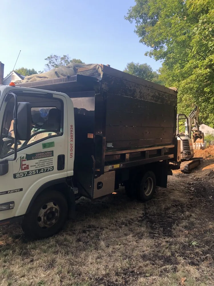 Top-rated lawn mowing service for residential properties in Needham, MA by J&E Landscape