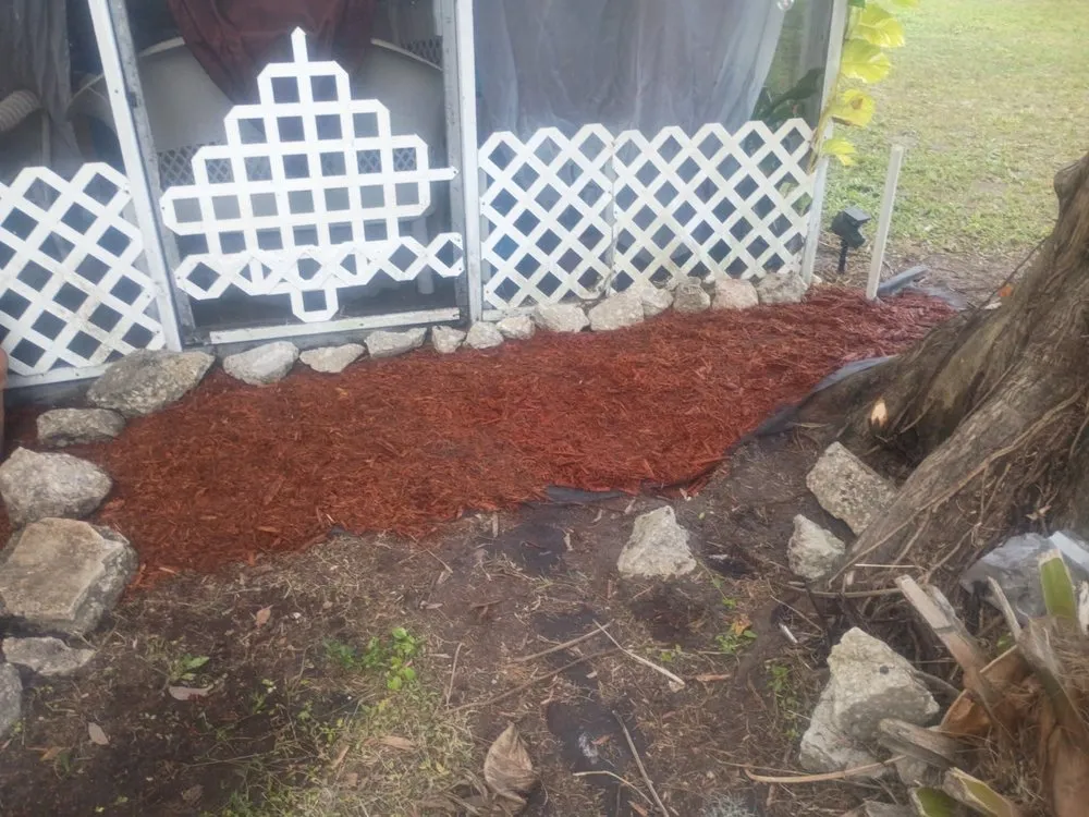 Custom yard cleanup service with custom design in Geneva, FL by J&E Landscaping Solution and Bounce Houses