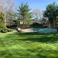 Custom lawn mowing service for year-round maintenance in Hyannis, MA by JEB Landscape