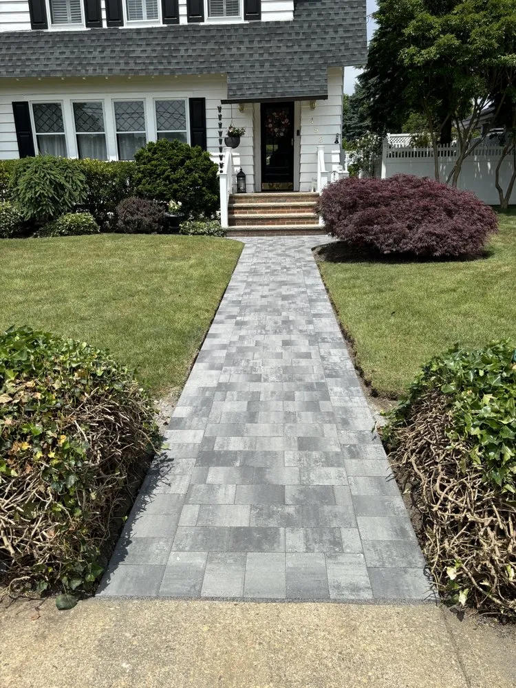 Expert lawn mowing service for residential properties across Freeport, NY - Jeffry’s Landscape Construction