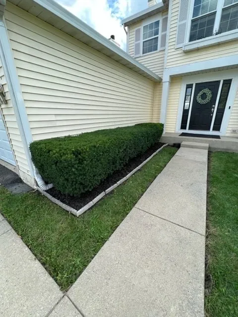Custom garden landscaping with custom design in Kenosha, WI by Jeff's Lawn and Snow