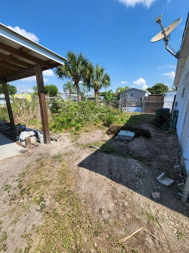 Professional lawn mowing service with custom design in Okeechobee, FL by Jen's Handy Cleaning