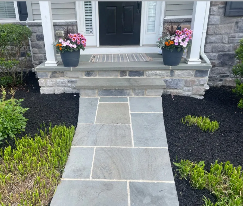 Custom lawn mowing service with custom design in West Chester, PA by Jeremy Russell Stone Masonry