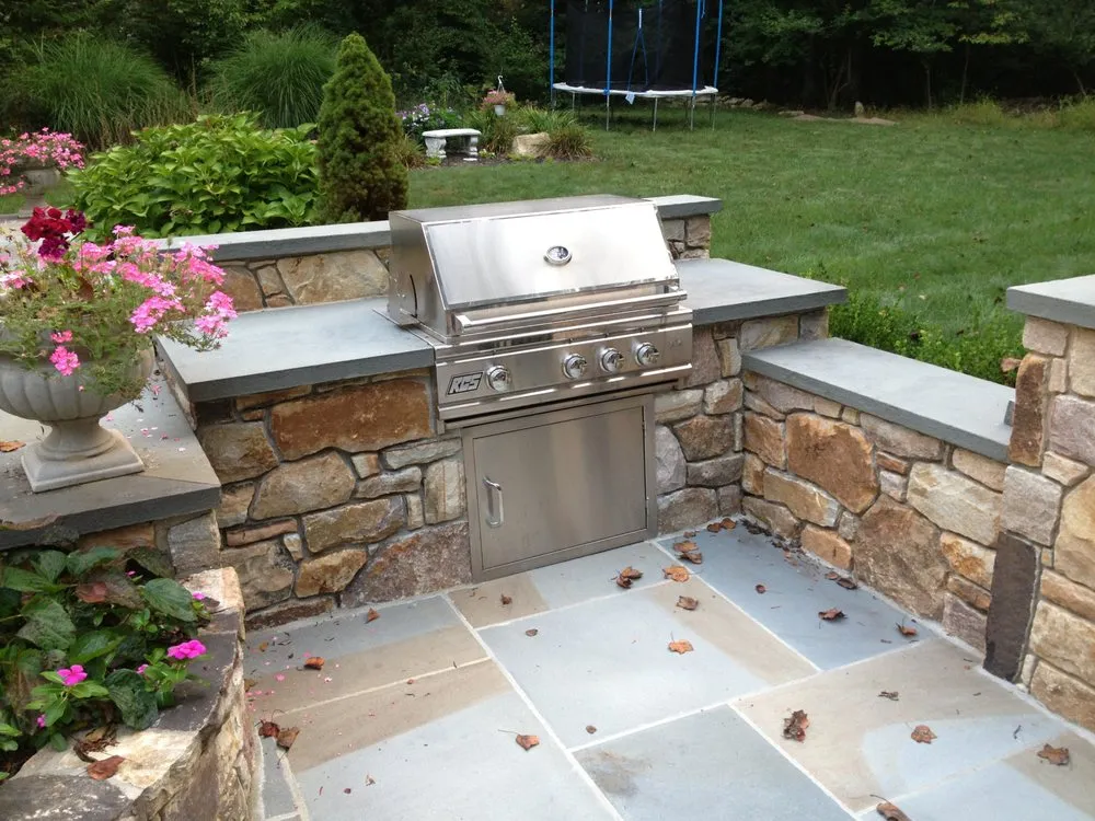 Professional lawn mowing service for residential properties across West Chester, PA - Jeremy Russell Stone Masonry