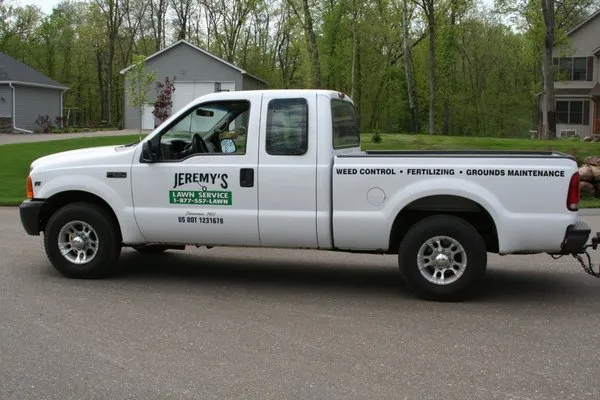 Jeremy's Lawn Service Logo