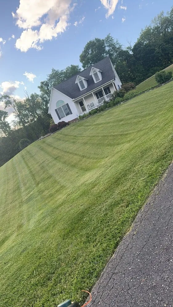Top-rated lawn mowing service in Burnsville, NC - Jerrys Lawn and Roofing