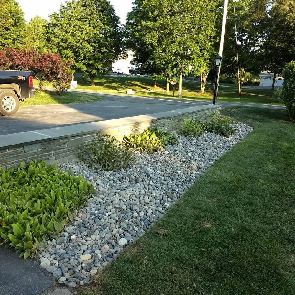 Affordable landscape design for outdoor upgrades in Kirkville, NY by Jesmer Services