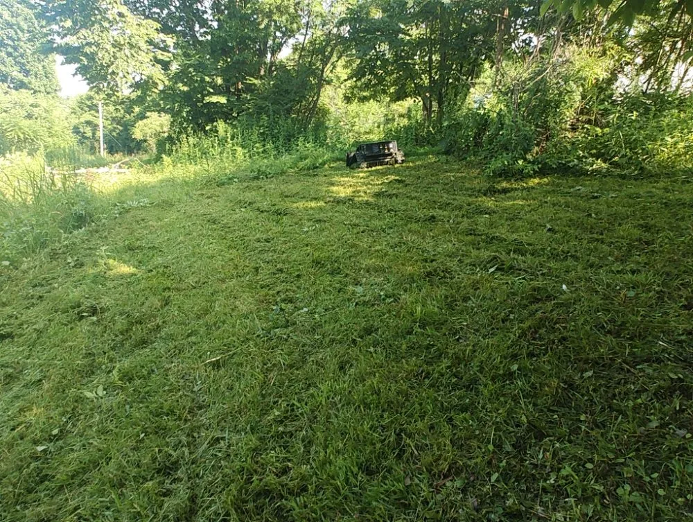 Professional landscape installation with custom design in Nashville, TN by Jesse's RC Steep Slope Mowing
