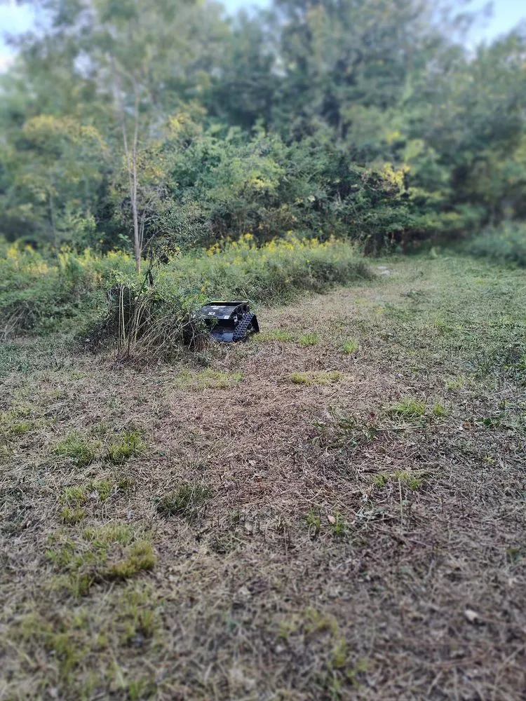 Trusted lawn mowing service for homes across Nashville, TN - Jesse's RC Steep Slope Mowing