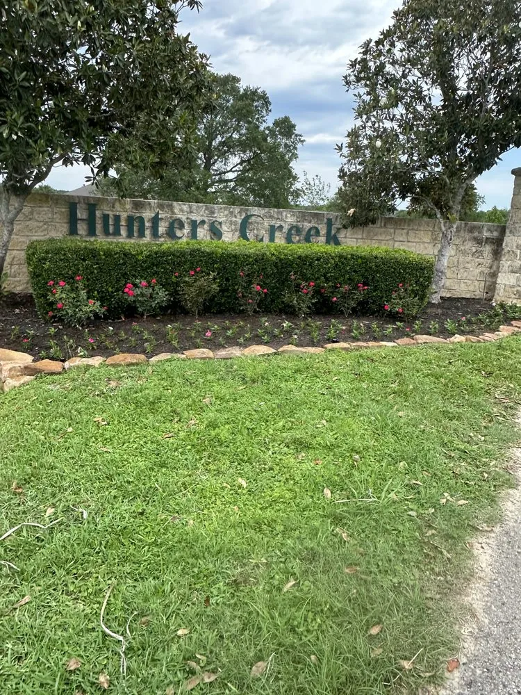 Custom landscape design with custom design in Tomball, TX by JG Landscaping