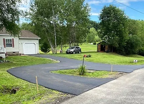 Professional lawn mowing service in Allegany, NY by J.H Paving and Landscaping