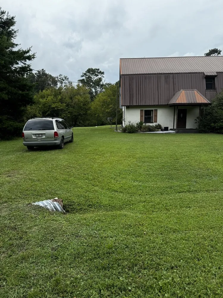 Professional landscape installation for outdoor upgrades in Lake City, FL by Jimmy’s Simple Lawn Care