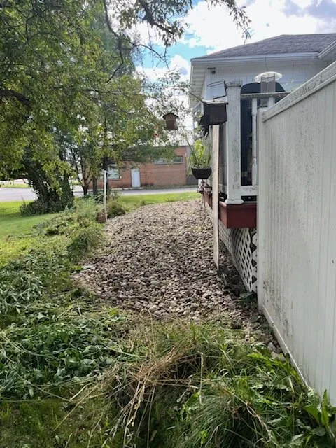 Trusted lawn mowing service with custom design in Escanaba, MI by Jiris Lawn Care & Shoveling