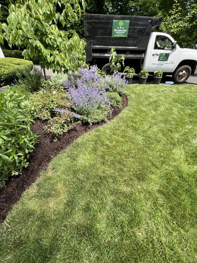 Custom landscape installation in Riverside, CT by J&J Lawn Care