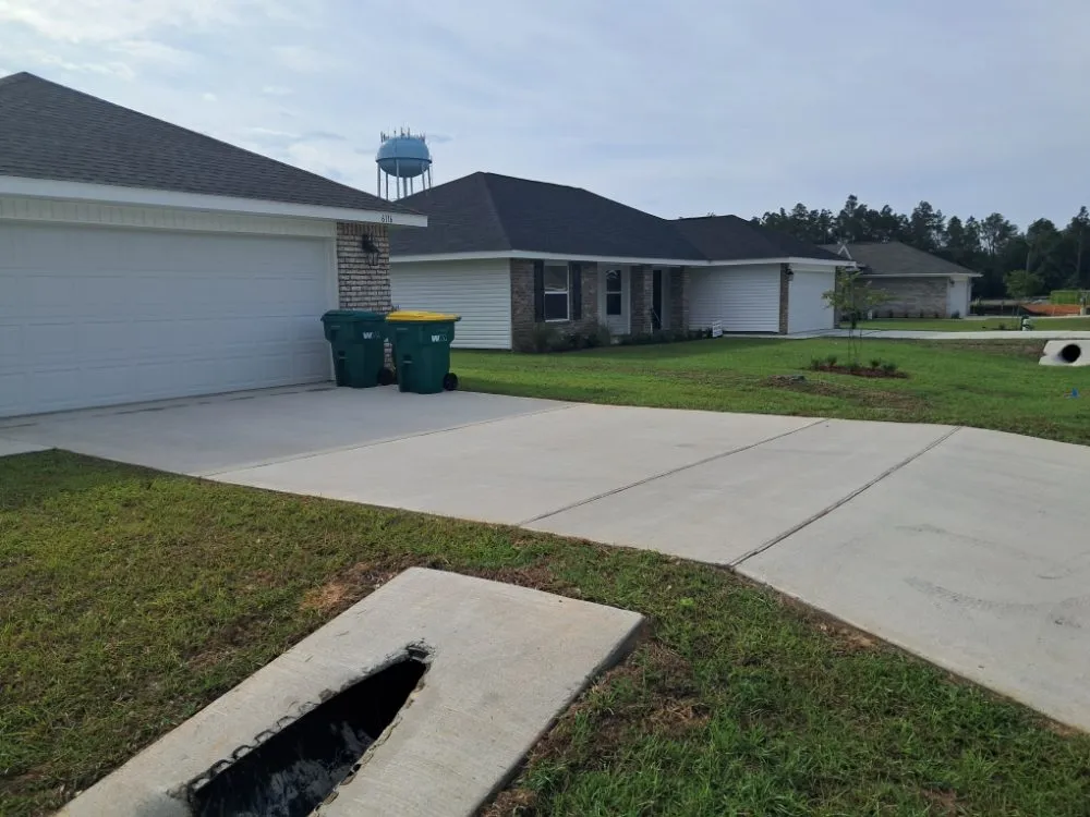 Professional lawn mowing service for homes in Crestview, FL by J&J Lawn Legends