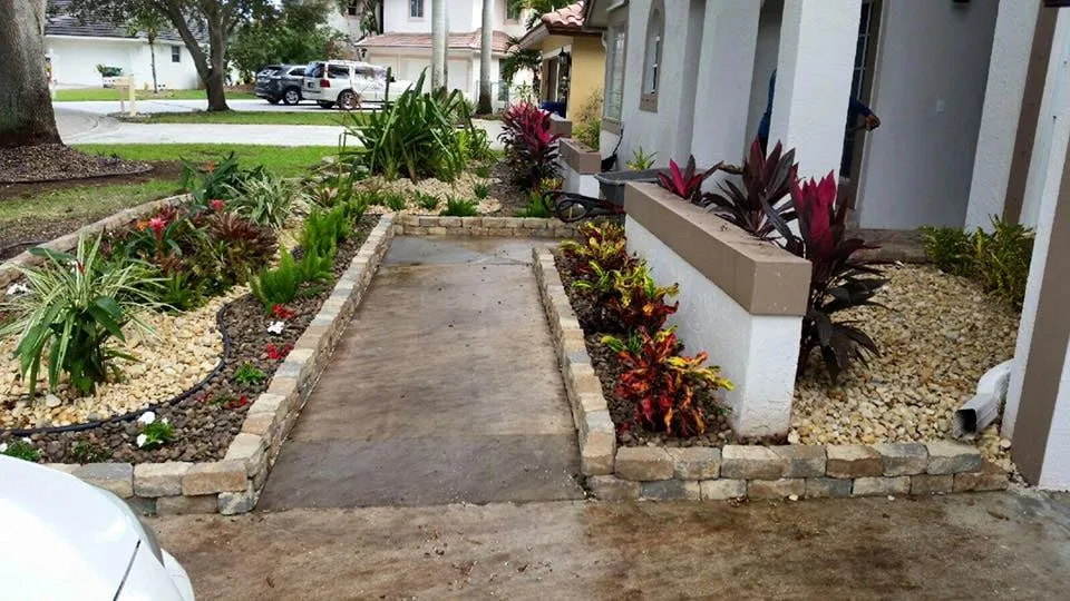Affordable garden landscaping with custom design in Coral Springs, FL by J&J Lawn Service