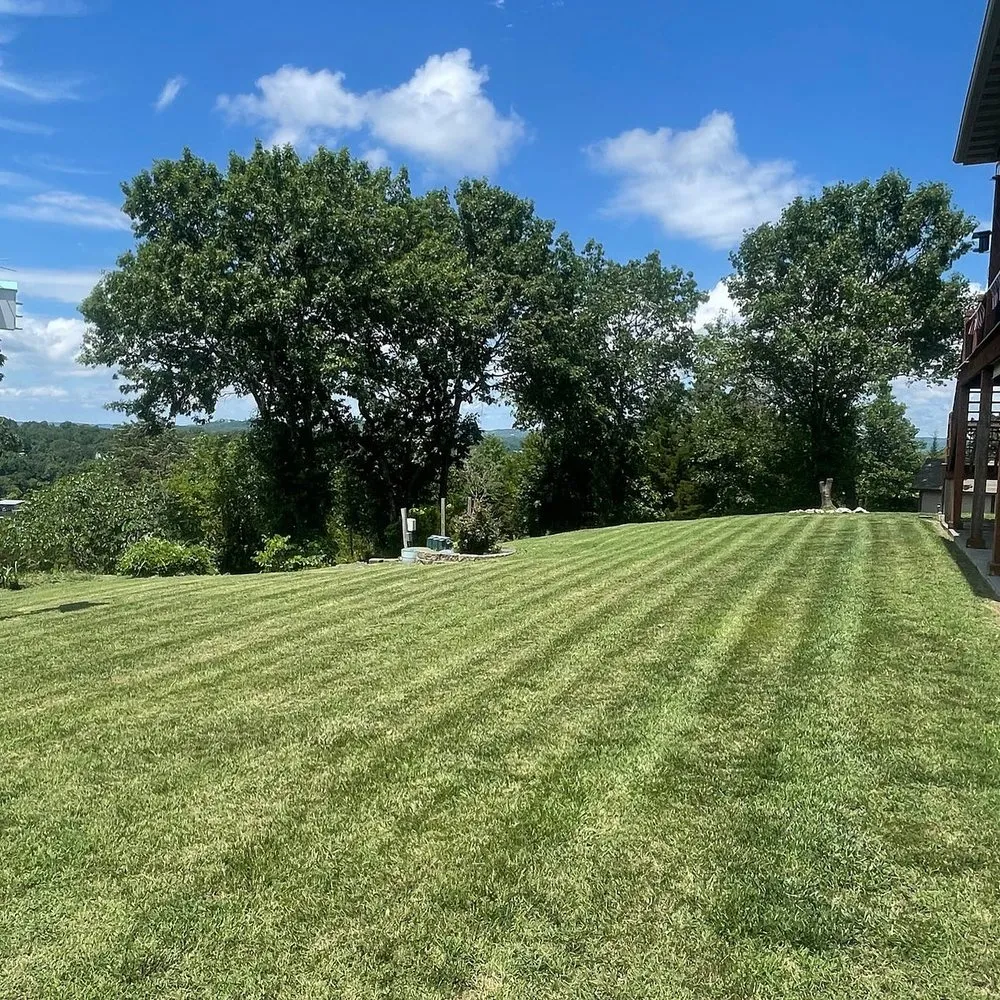 Professional garden landscaping for beautiful yards in Blue Eye, MO by J&J Lawncare