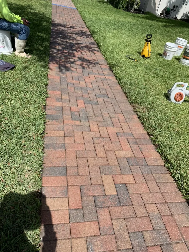 Top-rated lawn mowing service in Greenacres, FL by JJ Pavers