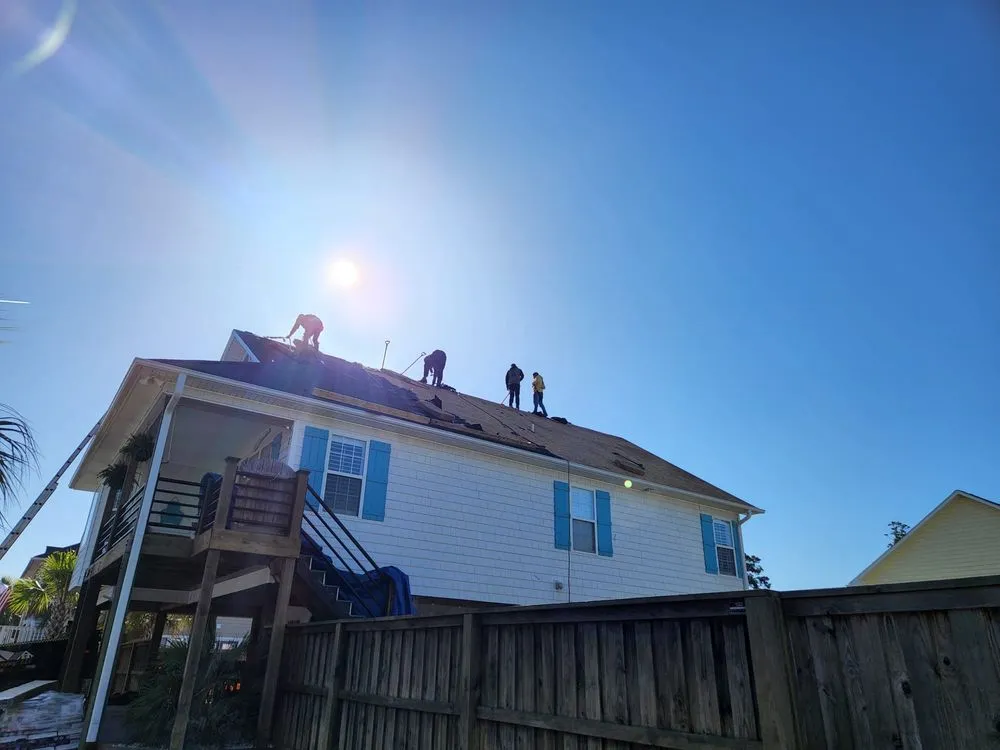 Professional lawn mowing service for outdoor upgrades in Wilmington, NC by JJ Roofing & Home Improvement