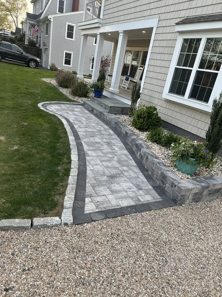 Expert lawn care service for homes in East Haven, CT by J&J Stone and Gardens