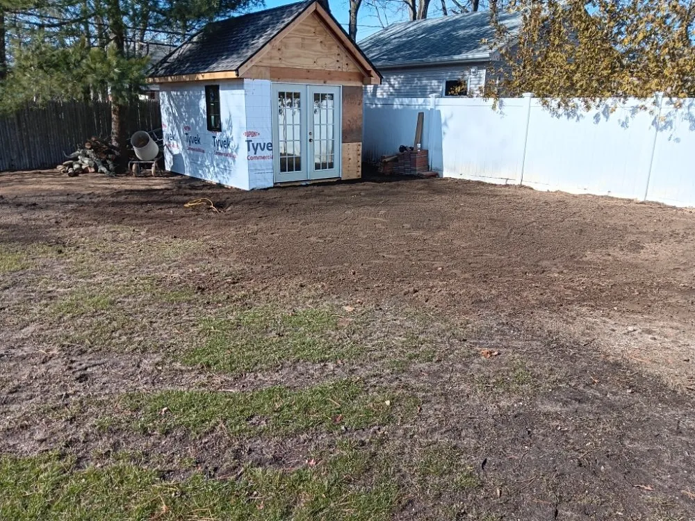 Affordable yard cleanup service for beautiful yards in Patchogue, NY by JJJ Landscaping