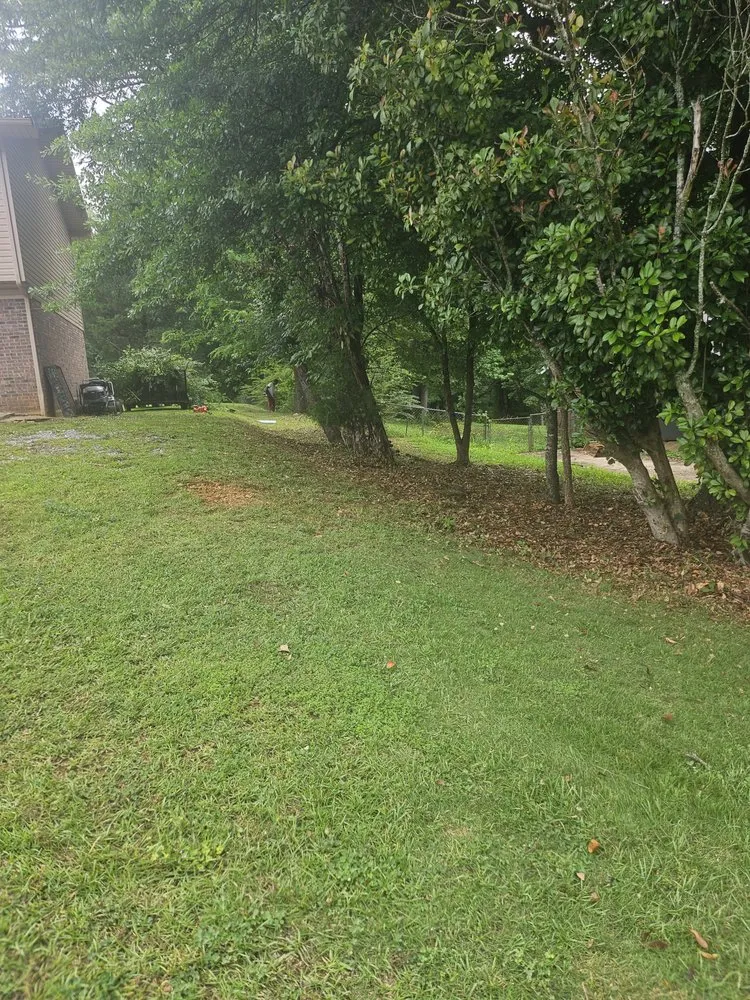 Custom outdoor landscaping for residential properties across Anniston, AL - Jjmc Lawn Maintenance and Handy Services