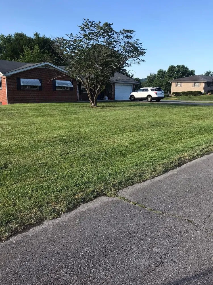 Affordable lawn mowing service for homes in Somerset, KY by JJ’s Mowing & Weed Eating