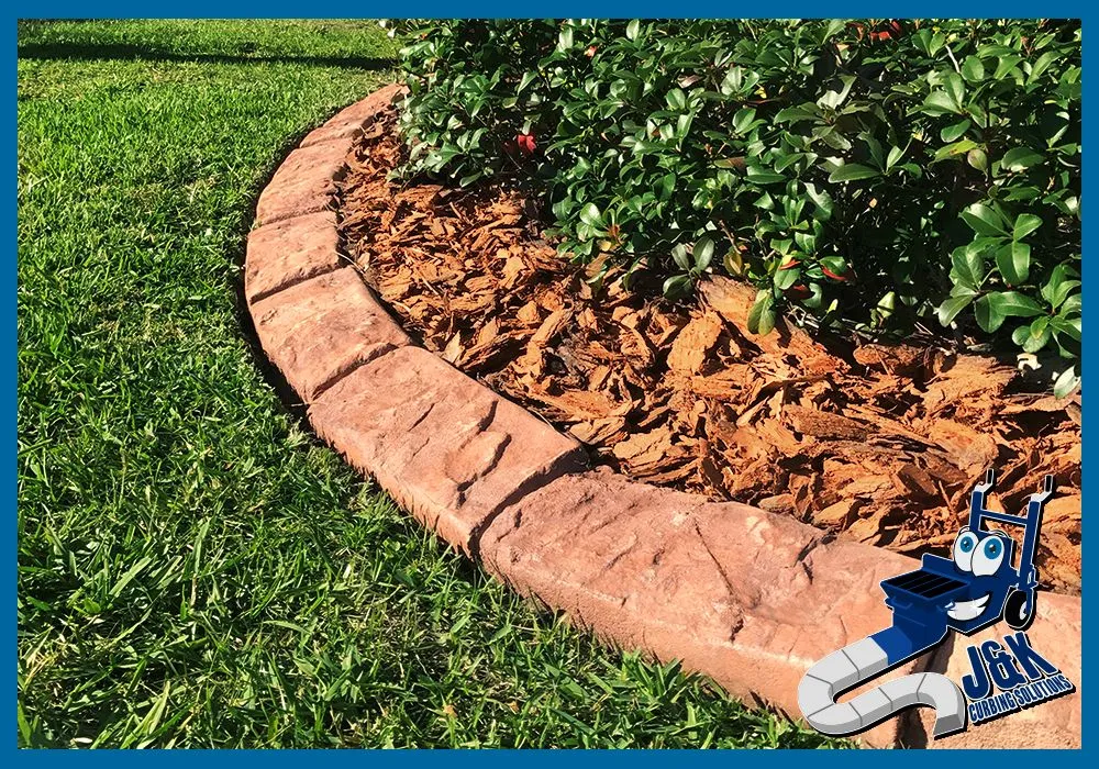 Affordable lawn care service for homes in Hernando, MS by J&K Curbing Solutions