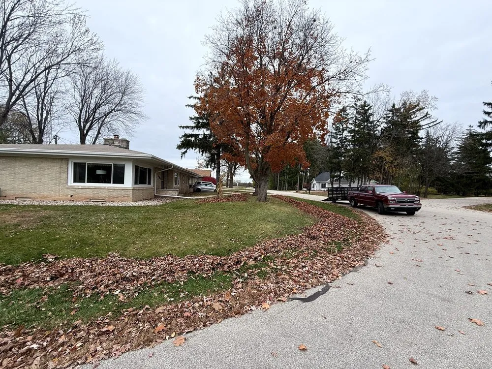 Reliable yard cleanup service for homes in Neenah, WI by JK Landscaping