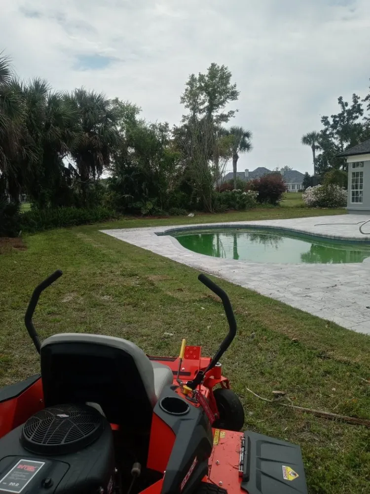 Local landscape design for year-round maintenance in Panama City, FL by JKRedd Lawntrepenures